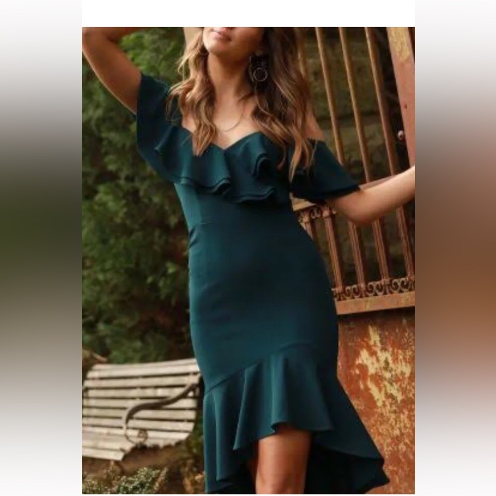Beautiful emerald green dress made by an Australian designer